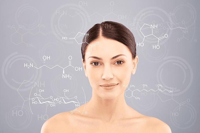 brunette woman in front of blackboard with collagen protein molecular formula